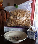 Author's Packaged Cereal, Milk Carton, Bowl and Spoon