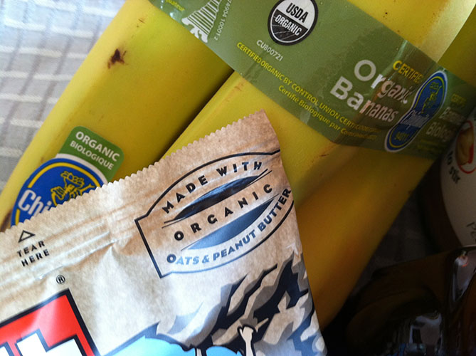 Clif Bar Made with Organic Ingredients and Bunch of Organic Bananas with USDA Seal