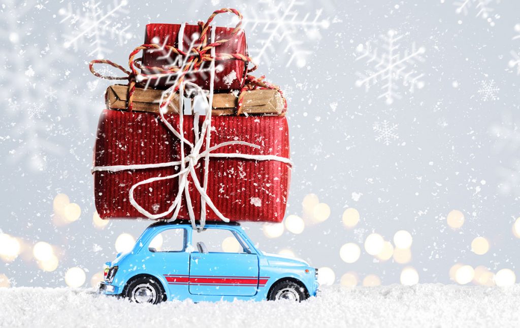 Little Blue Car Overloaded with Christmas Gifts on Top