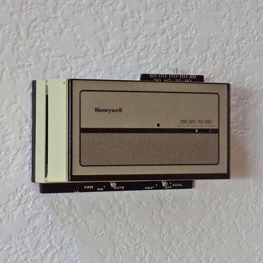Circa 1980s Programmable Thermostat Mounted on Wall