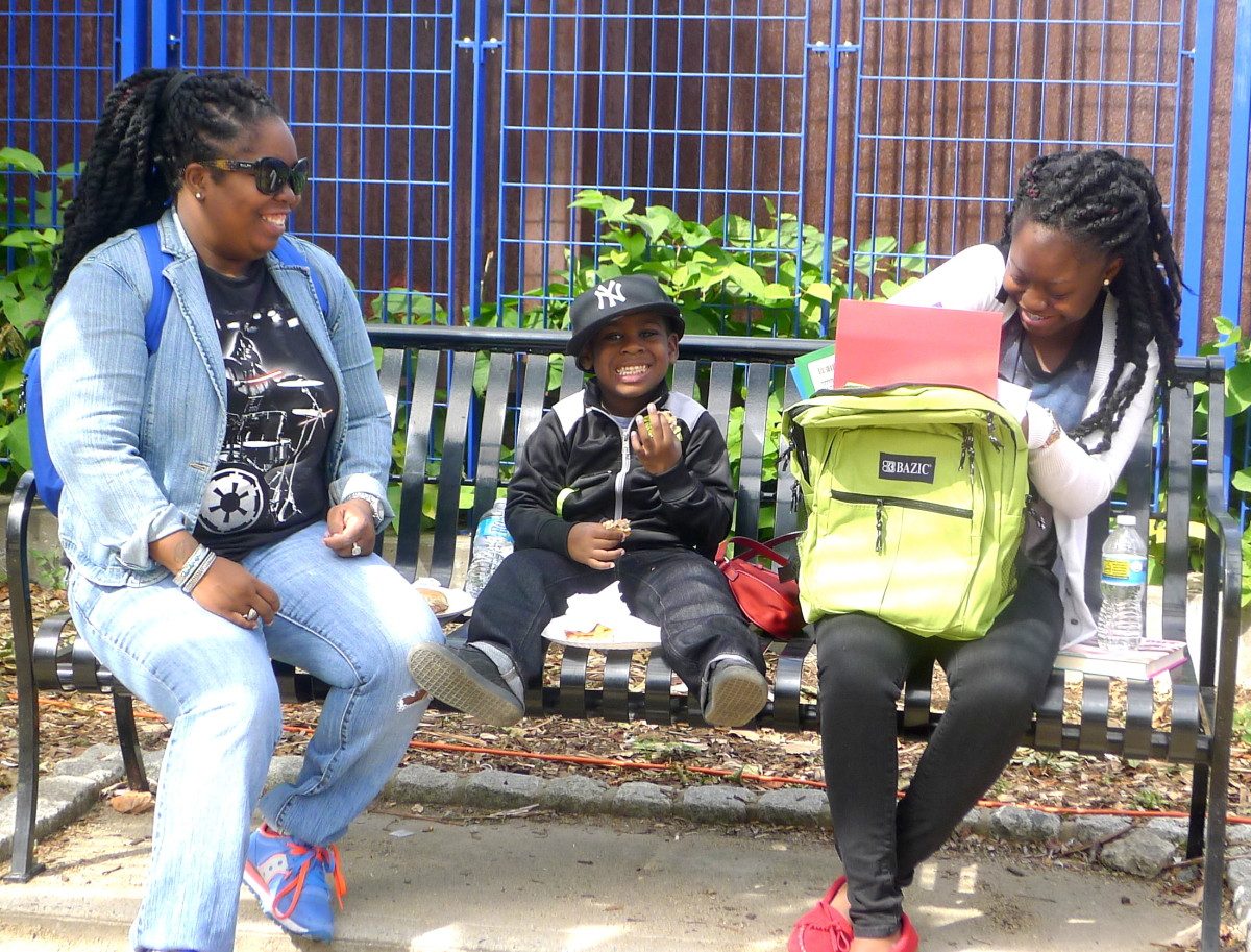 Two Women and a Child Enjoying Lunch at Hunts Point Riverside Park in 2015