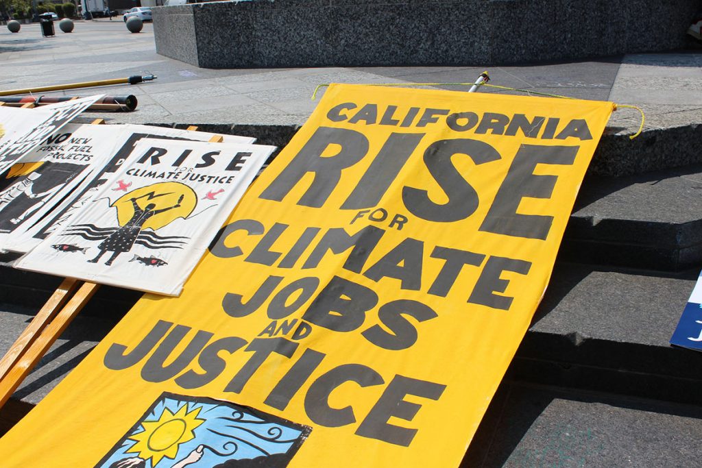 Rise for Climate Signs Ready for San Francisco March on September 8, 2018